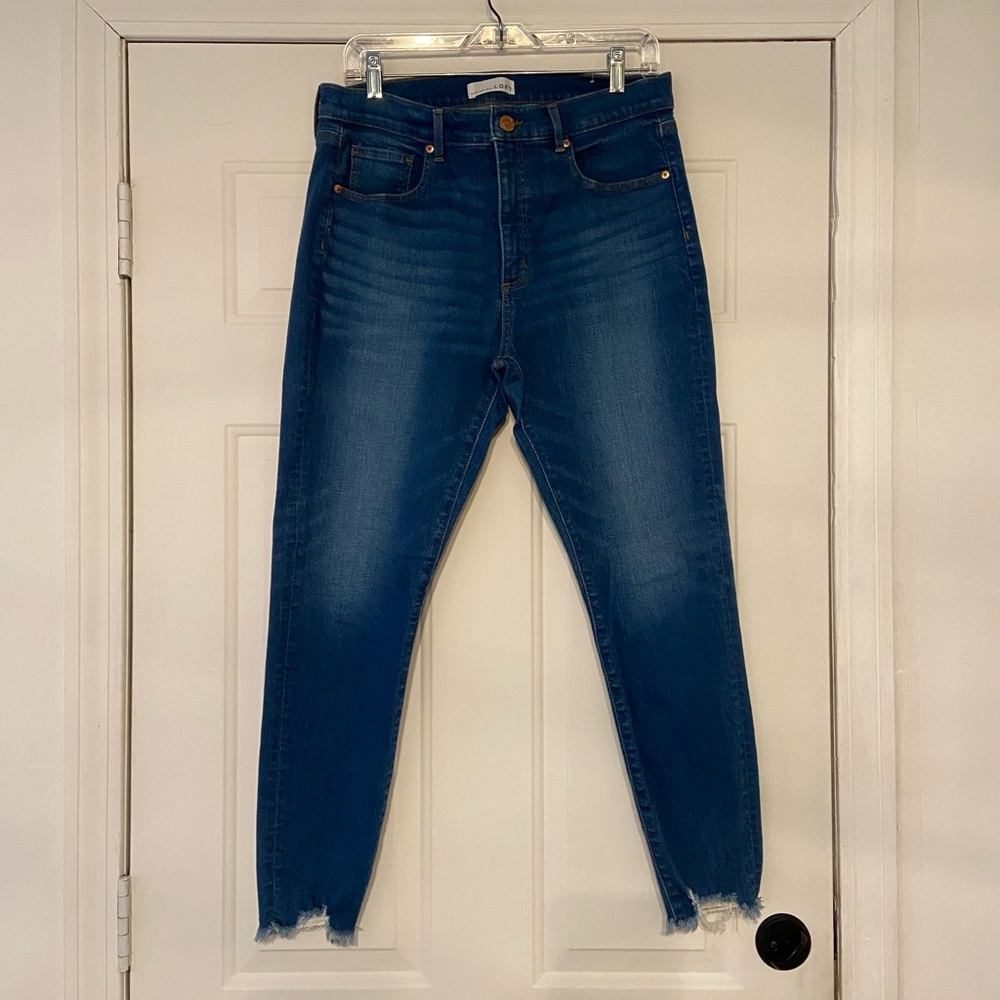 LOFT Dark Blue Women's Skinny Crop Jeans with Chewed Hem.